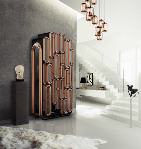 The Oblong Bar Cabinet is a fusion of modernistic and classical elements into a highly detailed and exquisite limited edition furniture piece. The modern cabinet was specifically designed to act as a statement piece in contemporary living rooms and raise the bar on luxury decoration.