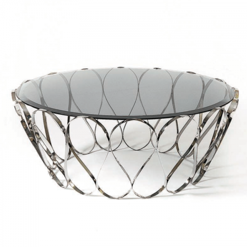 Aquarius is a very unique center table. An evocative of a fine jewelry piece, this striking table blends a certain delicacy with its contrasting strong character. Perfect for your contemporary living room.